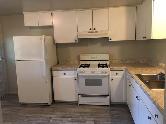 New flooring in kitchen and Bathroom