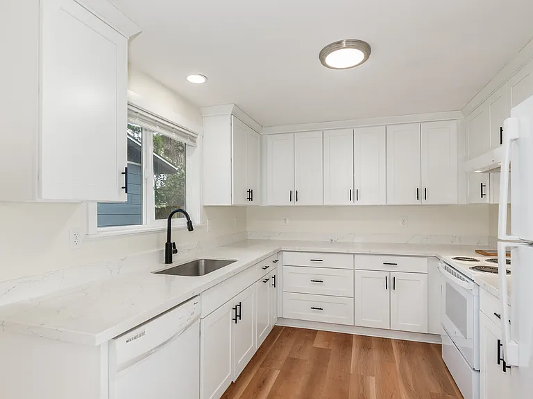 Main Level | Kitchen | 4 burner stove (electric), dishwasher, refrigerator/freezer, blender, instapot, toaster, microwave