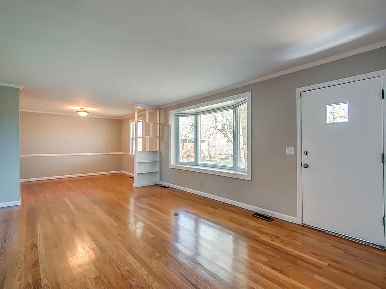 Bright living room with hardwood floors