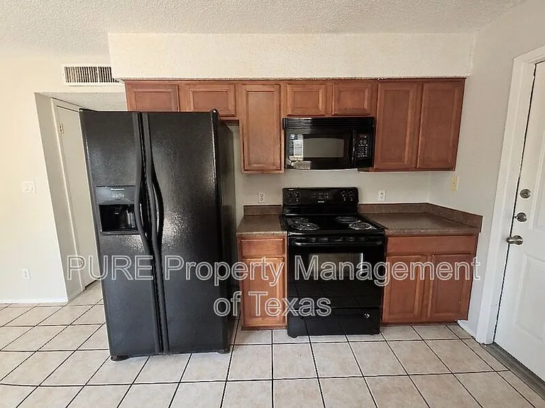 9611 Covey Ridge Ln — Photo 7