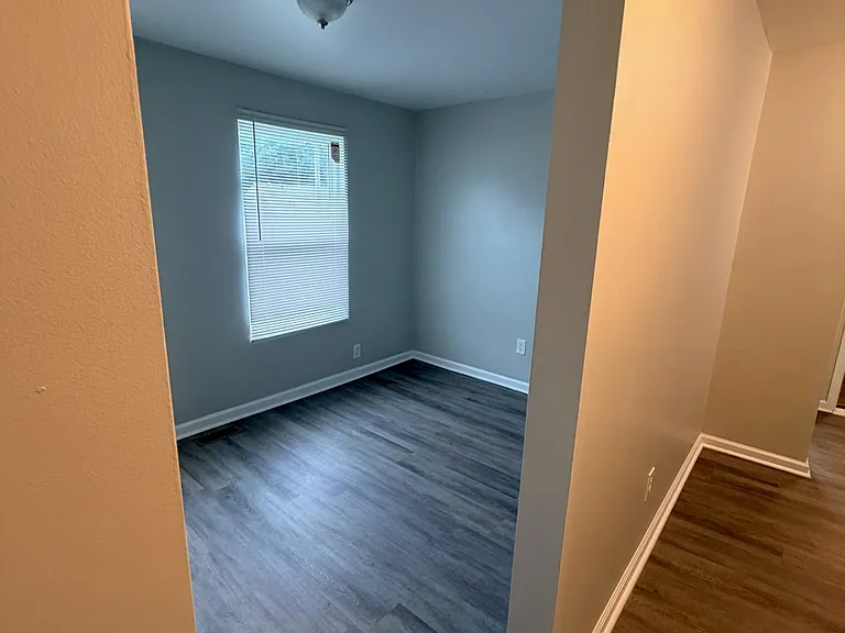 Bright and inviting living room/den with ample natural light.