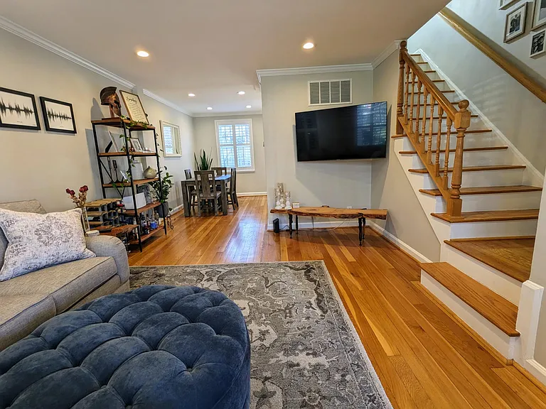 Main living area opens to upstairs and separate dining area