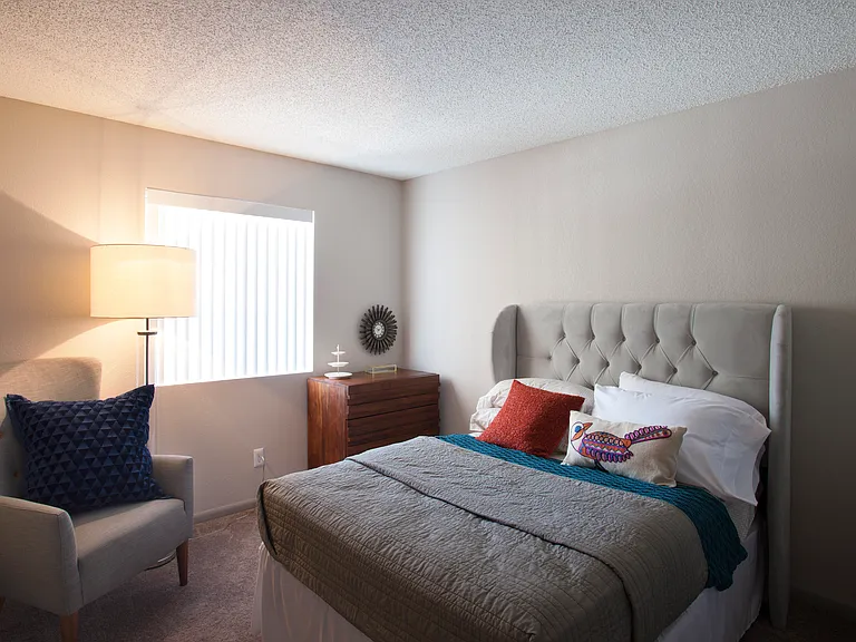The bedroom includes a large closet and sits next to the full bathroom