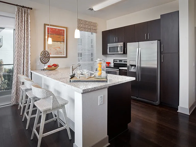 All homes feature stainless steel appliances, granite or quartz countertops and custom cabinets