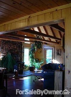 Open beam ceiling.
						:
						2-story great room.