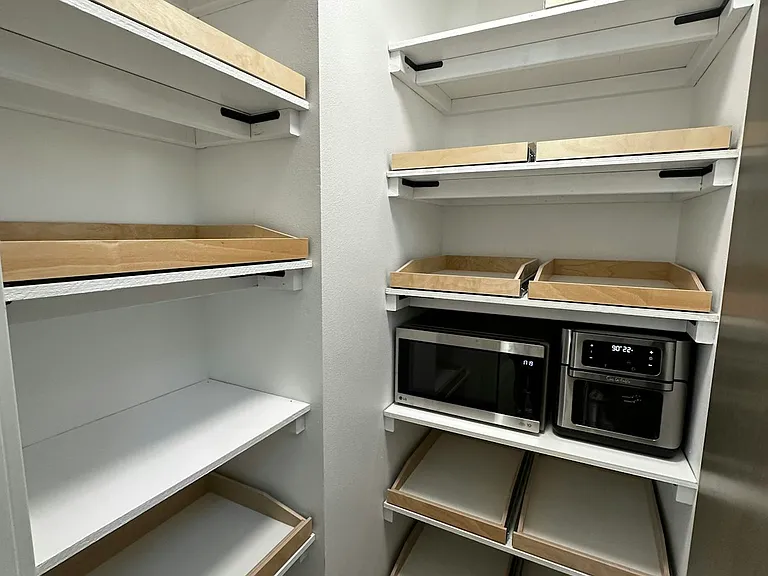 Renovated pantry with pull-out shelves