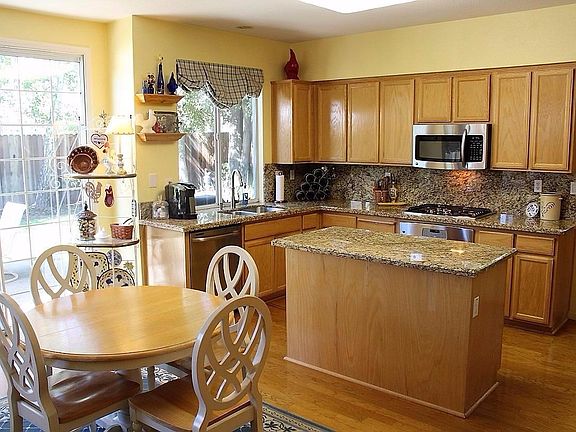 The kitchen is a Culinary Dream!  Granite counters, Great Room Concept.  Very open with natural light in abundance.