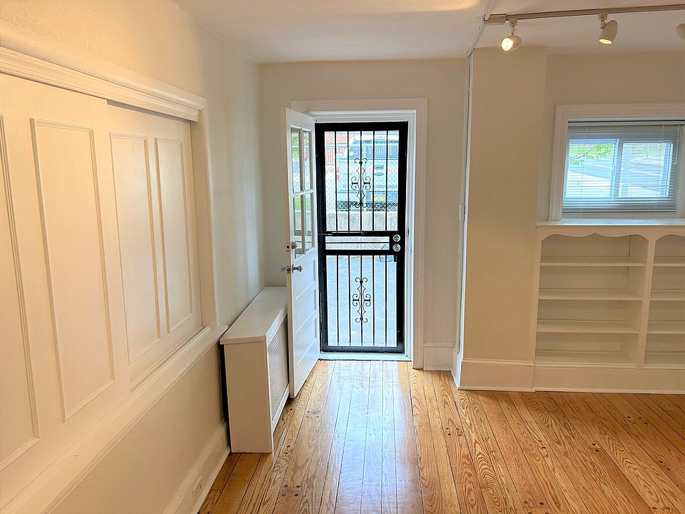 Entrance to Living Room-Built in Book Shelves-Track Lighting