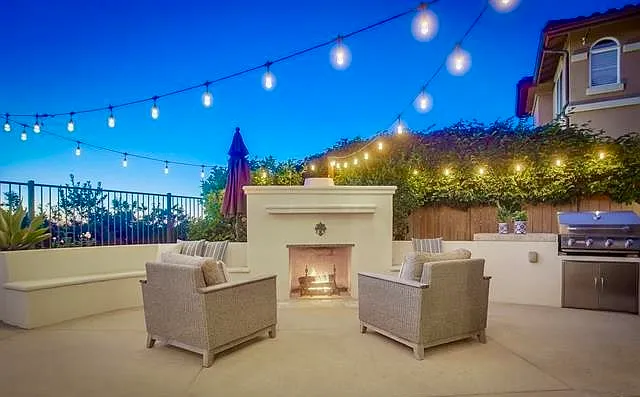 Backyard fireplace and BBQ area