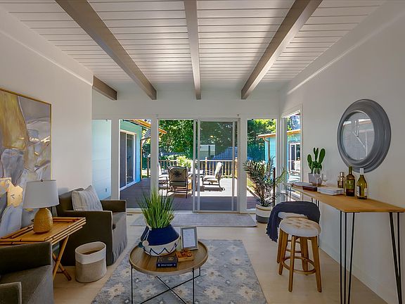 Bonus 3rd room with door for use as a guest bedroom nook, spacious office, or TV room