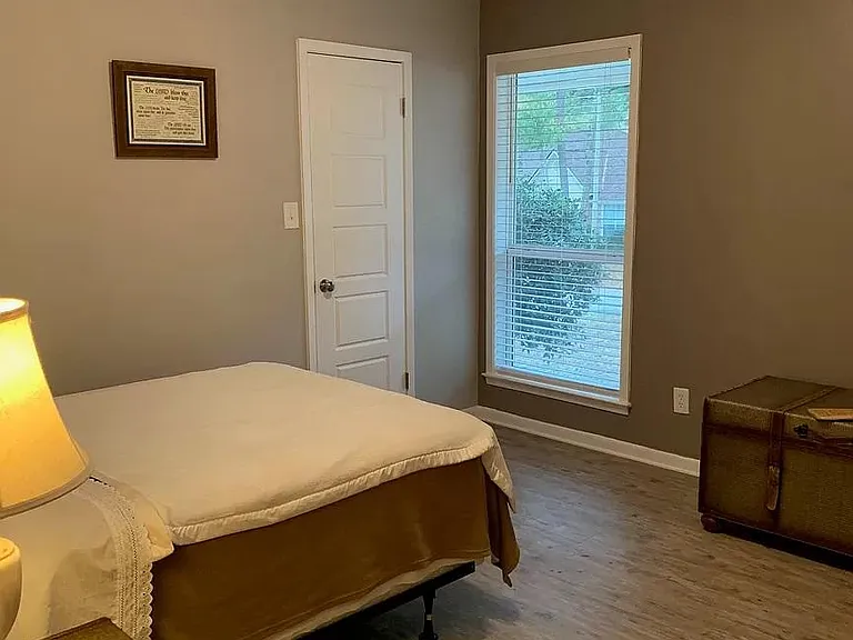 Guest bedroom with large walk-in closet