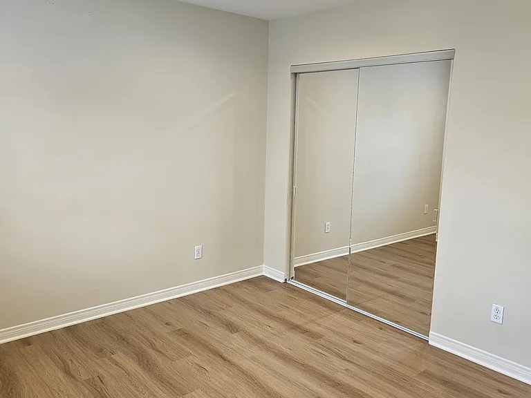 With mirrored closet