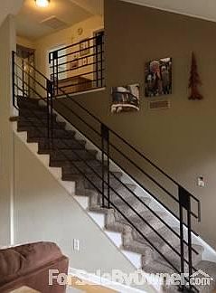 Staircase
						:
						Custom Ironwork staircase less than two years old.