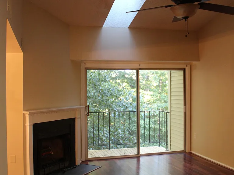 Living Room with fireplace and view