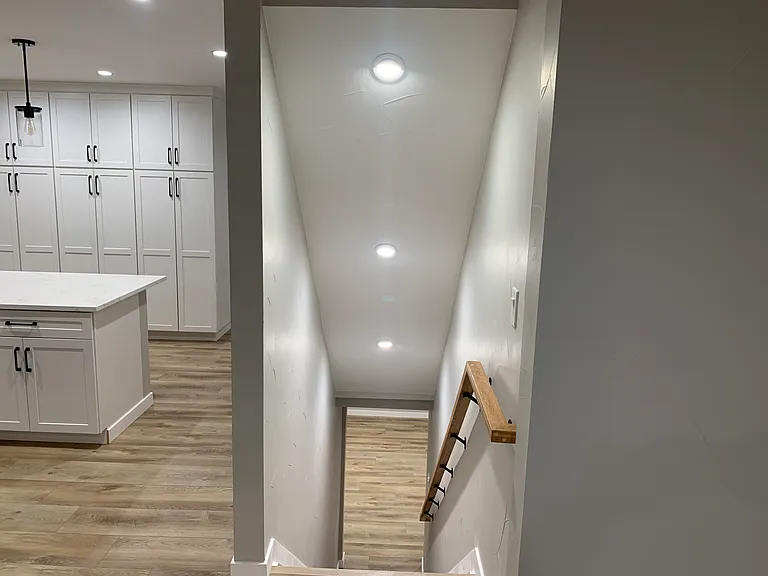 Stairs to basement from dining room