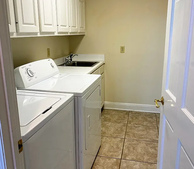 Laundry room also includes entrance to the garage