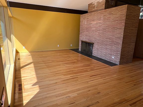 Alternate view of Living Area including Fireplace