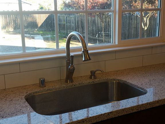 Kitchen sink overlooking back yard