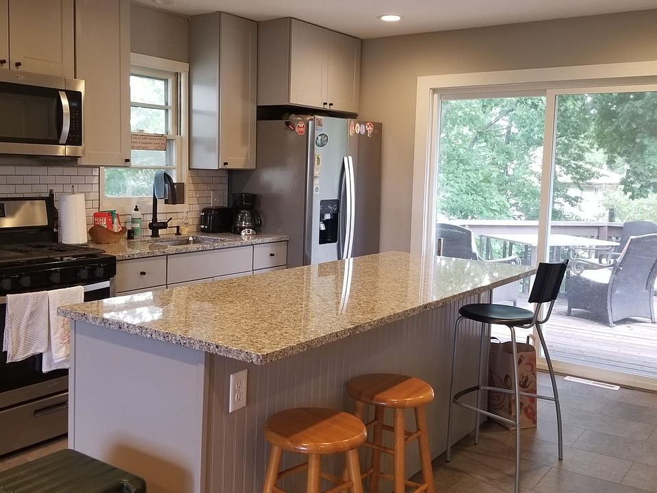 The newly renovated kitchen is bright and contemporary.