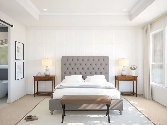 Primary suite with decorative feature wall