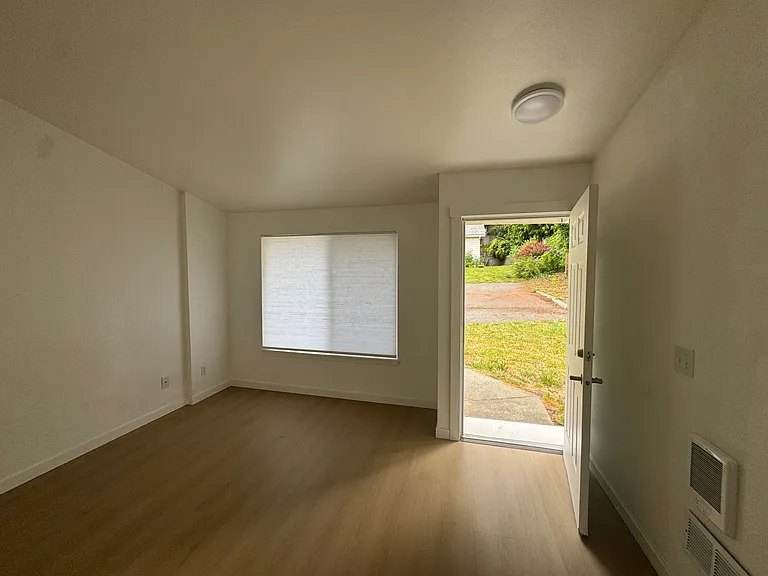 Private entrance leading into a bright and comfortable living space with easy access to the backyard.