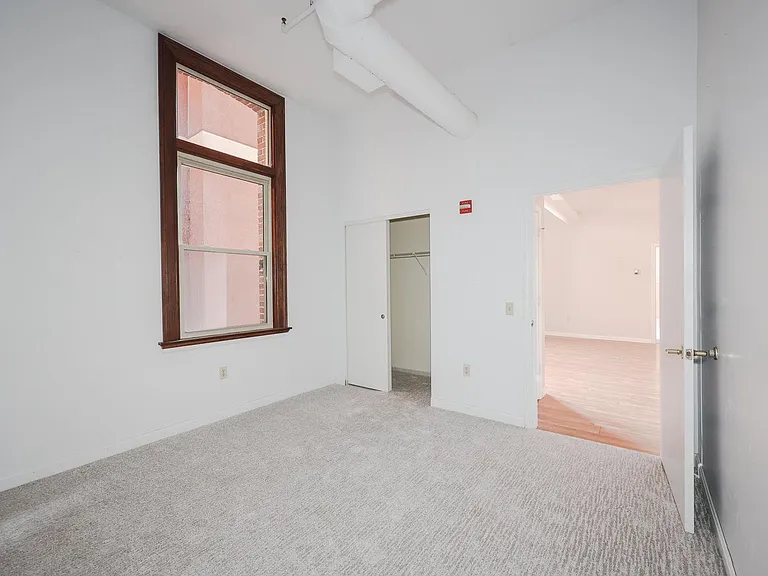 Second bedroom on opposite side of living area.
