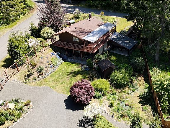 Welcome to Lake Cushman! This lovely rambler with finished basement is nestled in a country setting on a secluded lot.