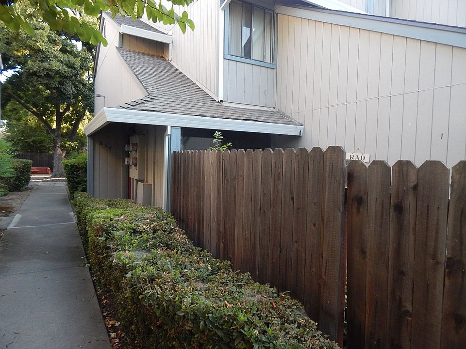 Welcome to 849 C! This cozy unit is tucked away in a quiet and well-maintained complex. The path leads directly to your front door and is easily accessible from the main complex area, offering a welcoming entrance in a peaceful neighborhood setting.