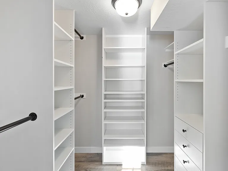 walk-in closet in master bedroom