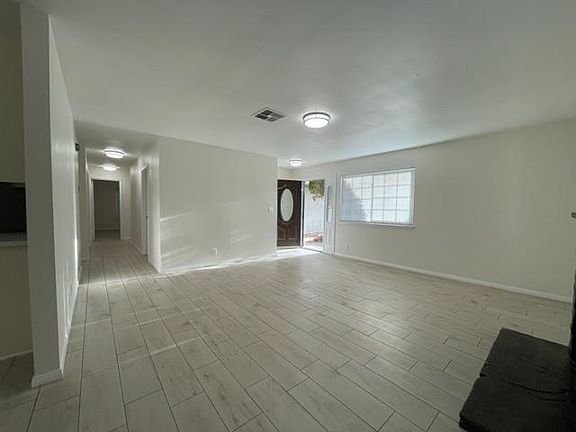 Living room with view of Hallway for bedrooms