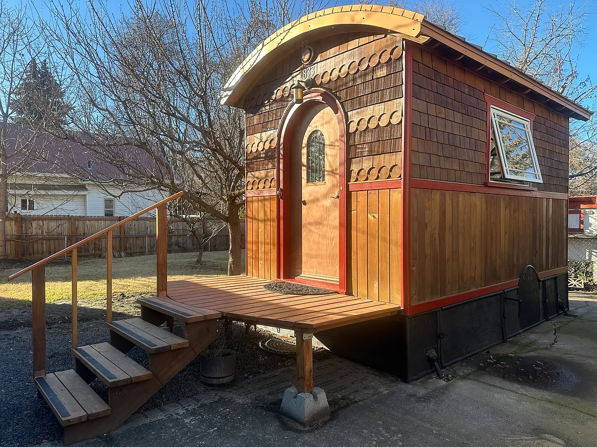 The Lucky Penny, originally built as a tiny house on wheels inspired by the vardos of the Romani people, is now an official ADU (accessory dwelling unit), a backyard cottage on a quiet lot on a tree-lined street. - 833 Valencia St