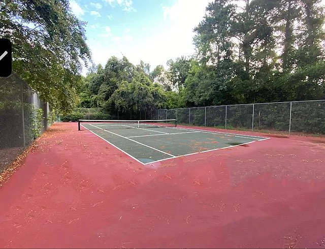 State-of-the-art tennis court just down the path!