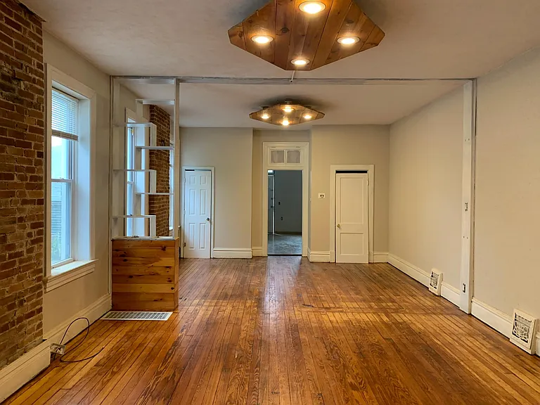 Living and dining room facing kitchen.