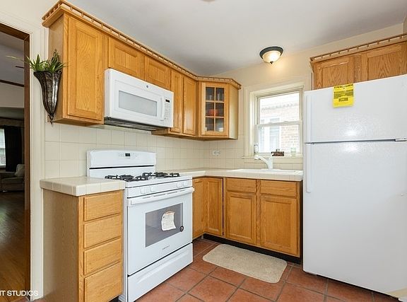 4th image of 5440 S Natoma Ave