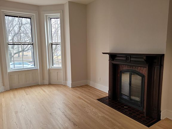 Original fireplace with beautiful details.