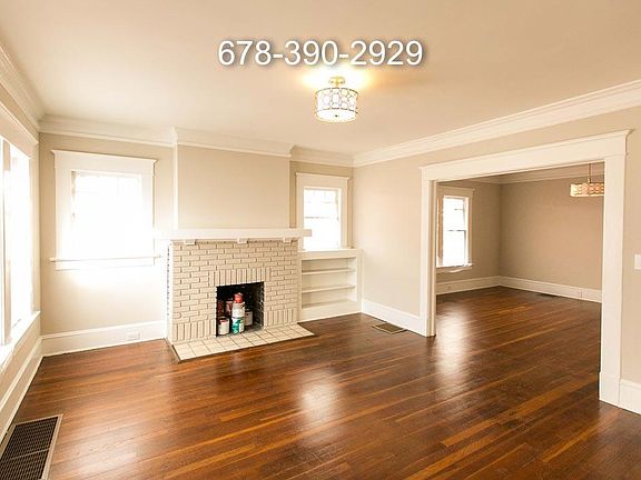 Gorgeous hardwood floors & original fireplace & built-ins