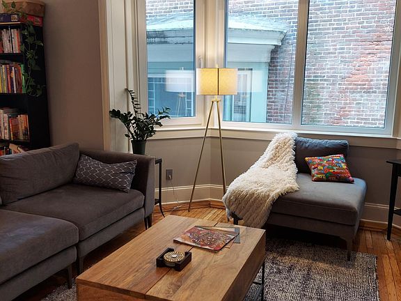 Living room bay window. North wall wired for cable & data.