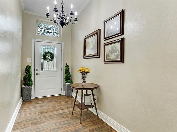 Lovely well-lit foyer.