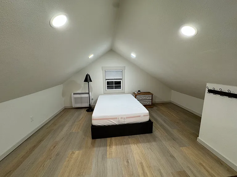 Large private flex suite with its own bathroom and wet-bar/kitchenette area_ideal as a guest space, office, media room or additional sleeping area. Please note that the upstairs space is open to the stairway and does not have a traditional bedroom closet.