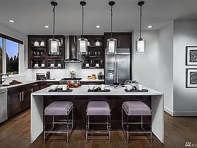 Granite counter tops with top of line appliances and high ceilings everywhere