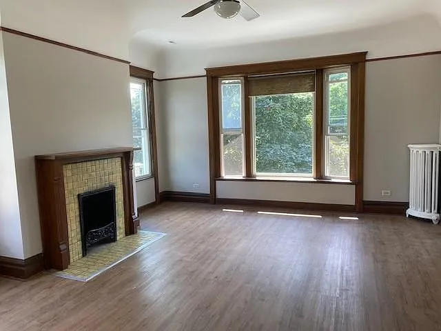 Living Room with view of lush trees