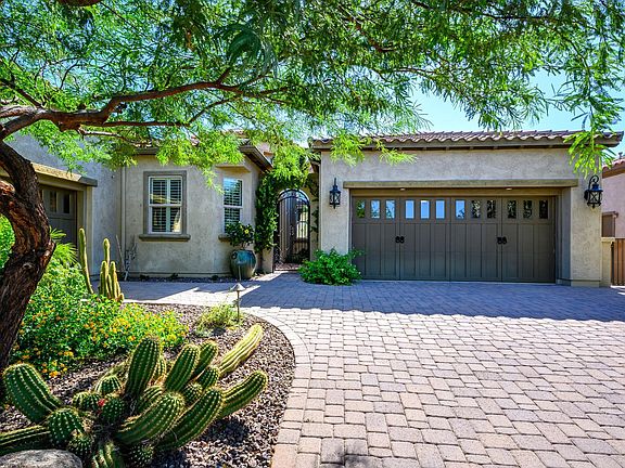 Pavered Driveway & 3 Car Garage