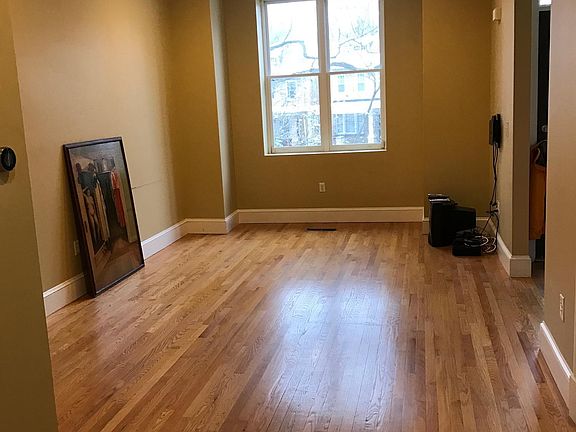 Living room looking to front of house.