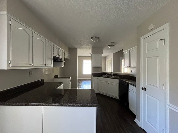 4th image of 8398 Wind River Cir N