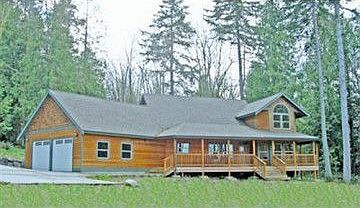 1st image of 9434 NE Country Woods Ln