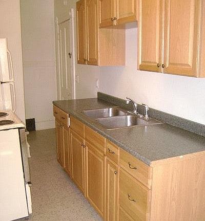 Updated Galley Kitchen, New electric glass top range and oven