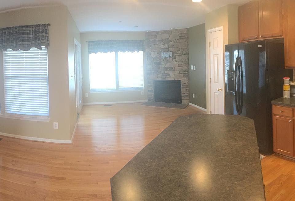 Eat in kitchen with sitting area and gas fire place