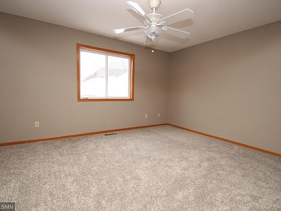 Master bedroom with a walk in closet and private master bathroom