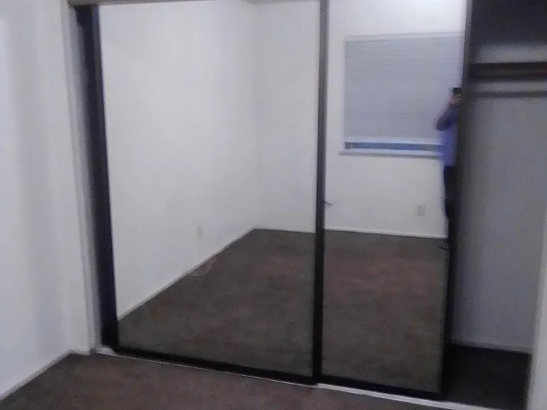 Bedroom #1 . Lots of beautiful closet space. Easy to get ready for all those important meeting.