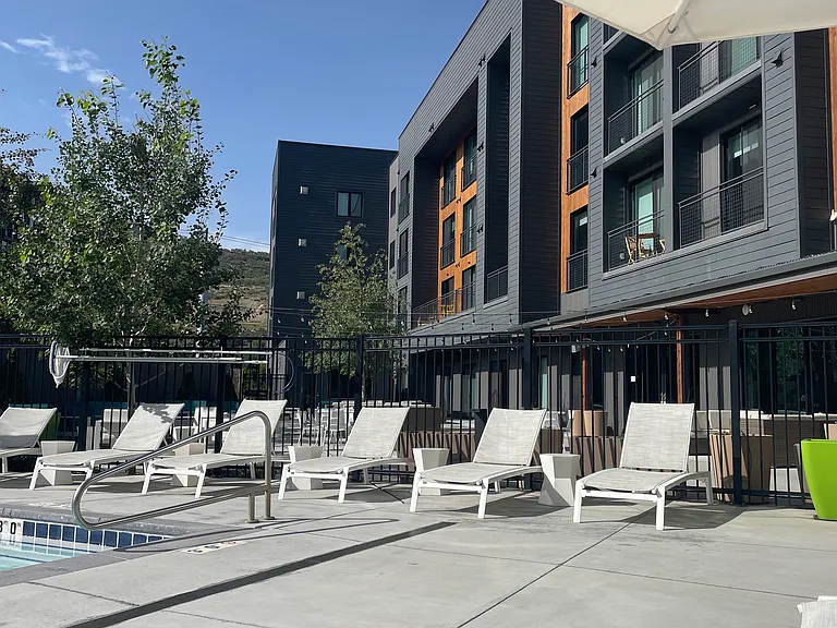 __ Lounge chairs by the pool
__ Relax in comfort on the lounge chairs next to the pool, soaking up the sun and enjoying the scenic mountain views. The perfect spot to unwind after a day of outdoor activities!